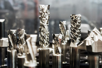 Fototapeta premium drills on metal of different length and diameter on a shop counter. Shallow depth of field