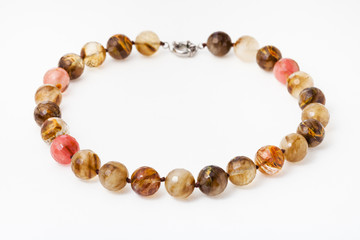 necklace from translucent agate gemsones on white