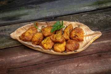 fresh zucchini flowers stuffed with vegetable stew