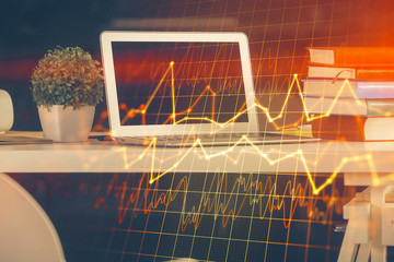 Multi exposure of chart and financial info and work space with computer background. Concept of...