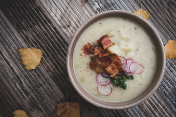Potato Soup Topped with Bacon, Radish Greens and Radishes