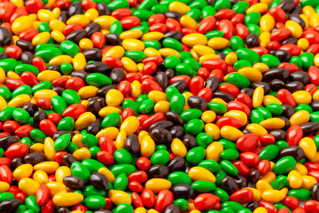 Closeup of a lot of little colored sweets
