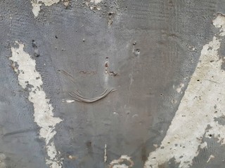  close-up of a decorative wall made of concrete, with a characteristic rough porous texture,...