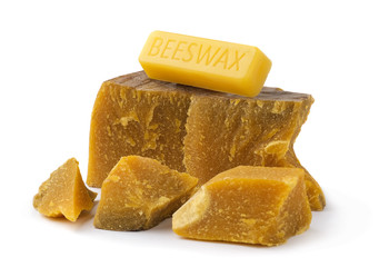 Bees Wax Beeswax Raw and Unpurified as it Comes Out of Hive, Melted and Broken into Pieces or Bits, in a Form of Heap or Pile. Production Ingredient for Medical and Cosmetics. Isolated on White.