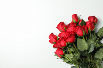 Bouquet of red roses on white background, space for text
