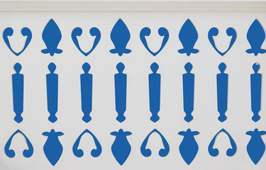 Hand made Turkish fence decor isolated on blue
