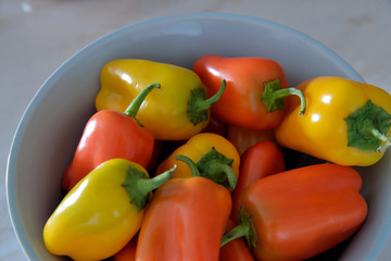 Small sweet peppers in a bowl.