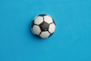 Fototapeta na wymiar soccer ball toy in color background