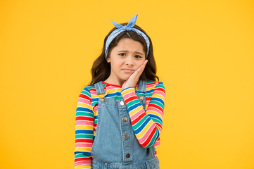 Dentist appointment. Little child suffer from toothache yellow background. Anti toothache remedy. Toothache painkiller. Pain relief. Dental disease. Toothache as dental pain. Plan to visit dentist