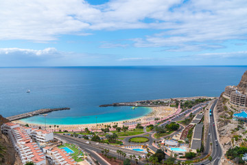 Beautiful stunning panoramic view of Puerto Rico. Playa de Amadores beach on Gran Canaria island in Spain near Tenerife island.
