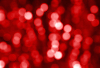 Abstract red background with silver sparkles. Blur. Bokeh.Christmas background