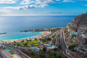 Beautiful stunning panoramic view of Puerto Rico. Playa de Amadores beach on Gran Canaria island in Spain near Tenerife island.