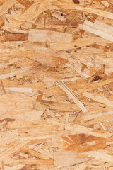 Wood board made from piece of wood, close up pressed wooden panel background