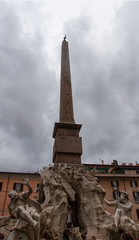 Fototapeta na wymiar Rainy day in Rome looking at the fountain in Piazza Navona
