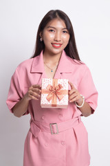 Young Asian woman with a gift box.