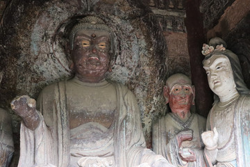 Obraz premium Maijishan Cave-Temple Complex in Tianshui , Gansu Province , China. Artistic treasures of Maiji Mountain caves. UNESCO World Heritage Site.