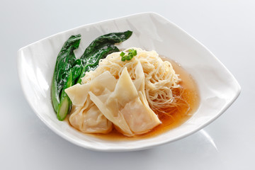 Dumpling noodle soup with vegetables