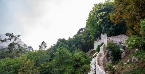 Fototapeta na wymiar castle wall in the mountains
