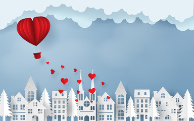 Paper art, Craft style of Red heart balloon flying to the sky over the village, Love and Happy Valentine's Day