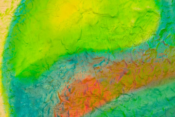 Beautiful bright colorful street art graffiti background. Abstract geometric spray drawing fashion colors on the walls of the city. Urban Culture detailed close up  rough texture