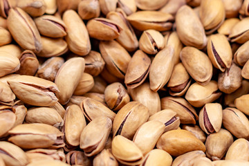 Unpeeled pistachios in bulk. Top View.