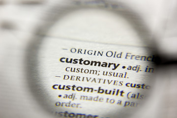 The word or phrase Customary in a dictionary.