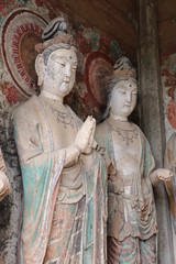 Obraz premium Maijishan Cave-Temple Complex in Tianshui , Gansu Province , China. Artistic treasures of Maiji Mountain caves. UNESCO World Heritage Site.