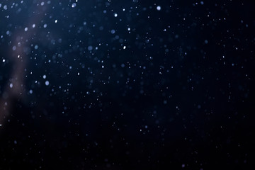 Fototapeta na wymiar Falling snow on black background. Design element as overlay. Christmas concept
