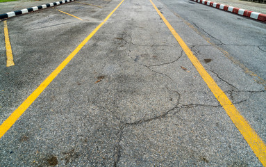 Fototapeta premium asphalt road with black and white concrete curb