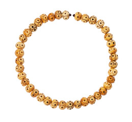 top view of string of carved bone beads isolated