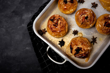 Homemade roasted apples on white background