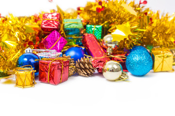 Close up of Cristmas present box with some colorful papper and toys