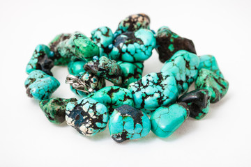 tangled string of beads from tumbled dyed howlite