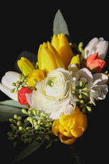 Wedding bouquet with roses and tulips