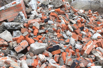 Construction waste with elements of various dismantled and destroyed old structures at municipal...