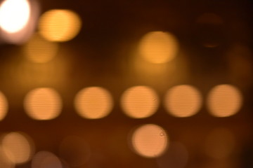 golden and colorful light bokeh at night on the road  background 