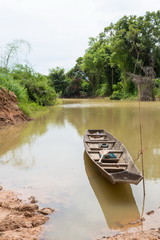 Old wooden boat for fishing in the river
