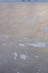 ice background with marks from skating and hockey, blue texture