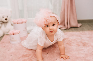 Portrait of adorable baby girl, birthday party for 1 year old kid