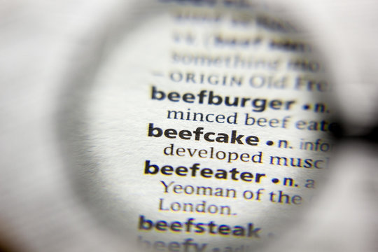 The word or phrase Beefcake in a dictionary.