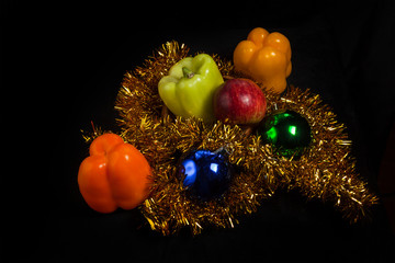 Fototapeta na wymiar Christmas and New Year an unusual look at images and postcards. Pepper and balls