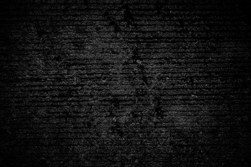 Wall grunge black concrete with light background. Dirty wall concrete blackboard texture and line or abstract background.