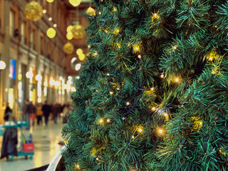 Obraz na płótnie Canvas close-up view of the decorative LED lights of a large Christmas tree.
