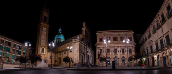 Fototapeta na wymiar Panorama of the famous ceramic sicilian town Caltagirone and its historic city center at night in Sicily, Italy