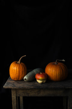 Pumpkin Still Life On A Wooden Rustic Table