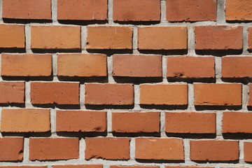 eine rote Steinmauer