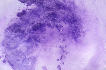 Obraz na płótnie Canvas Violet lilac liquid abstract art background. Splashes and stains of paint, emotional concept