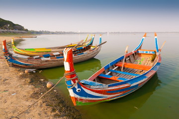 Fototapeta na wymiar Myanmar. Landscape. Boats in lake. Trash