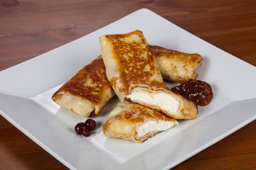 Pancakes stuffed curd with jam