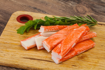 Crab stick surimi over board